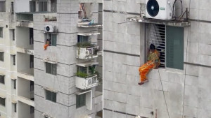 বাড়ি যেতে না পেরে সাততলার কার্নিশে গৃহকর্মী