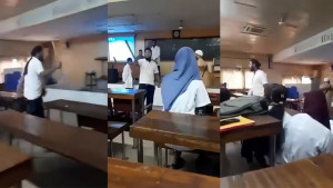 ক্লাসরুমে লাঠি হাতে রহস্যজনক যুবক