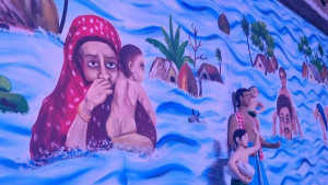 মণ্ডপের দেয়ালে দেয়ালে মানবতার চিত্র
