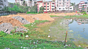 চট্টগ্রামে পাহাড়ি মাটিতে শতবর্ষী পুকুর ভরাট
