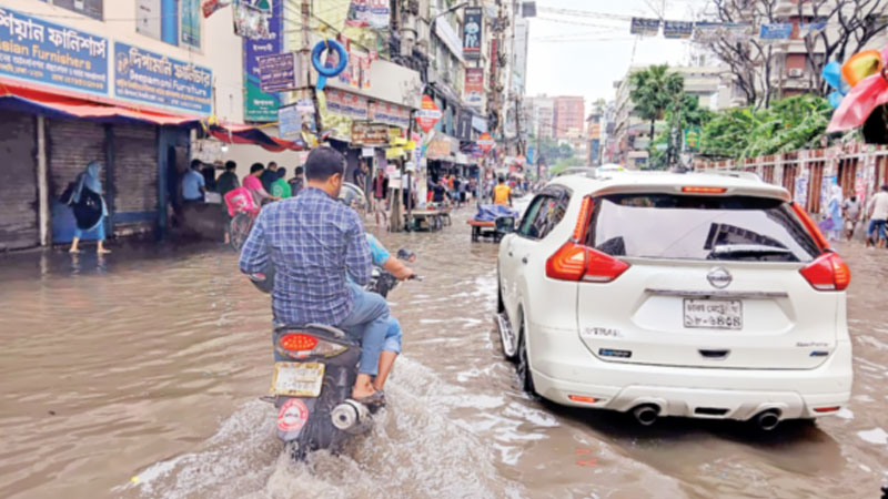 ঢাকা শহরে জলাবদ্ধতার বিপদ ঢাকা শহরে জলাবদ্ধতার বিপদ