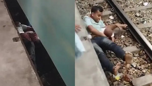 চলন্ত ট্রেনের নিচে পড়ে যায় শিশুটি, জড়িয়ে ধরে শুয়ে প্রাণ বাঁচালেন বাবা