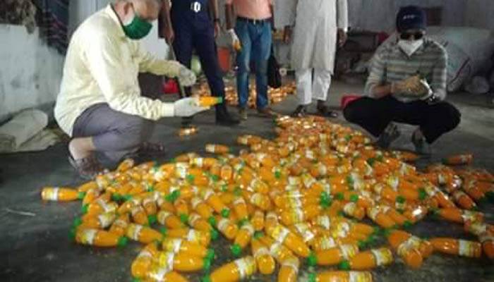 বগুড়ায় রাবার তৈরির কারখানা অন্তরালে নকল জুস উৎপাদন