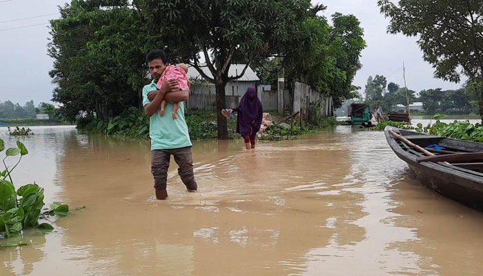 পাহাড়ি ঢলে পানিবন্দি রৌমারীর ৪৯ গ্রামের মানুষ