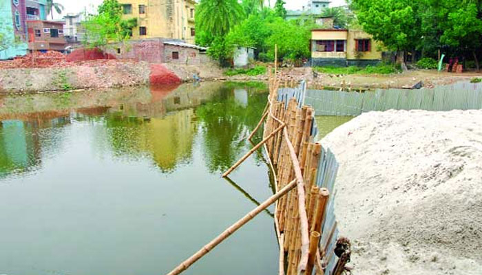 পুকুর ভরাট করে সরকারি অফিস, সুউচ্চ ভবন
